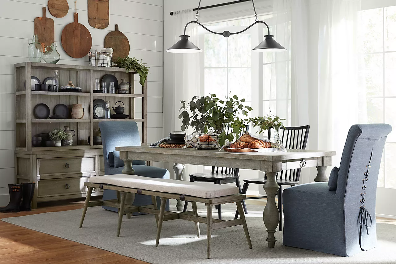 Remington Rectangle Dining Table, Dining Bench, and China Cabinet in Grey and Dining Chairs in Black and Mariah Parsons Chair in Alexander Denim in a room scene.